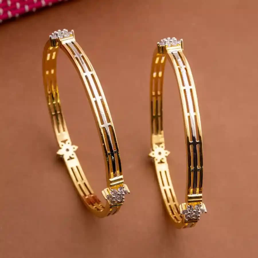 The Daily Gold Carves Bangles